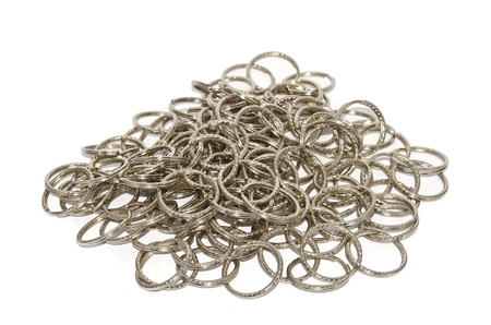 metal rings hold together as chain on white background