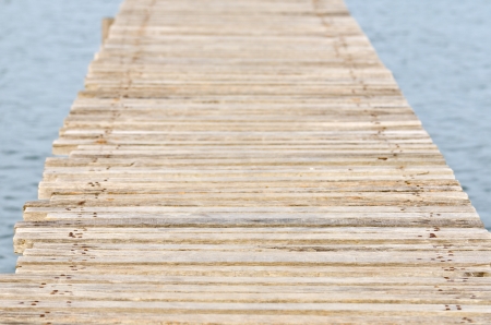 Wooden bride over the waterの写真素材