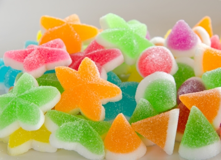 Many bright color jelly candies, sweets with sugar tasty as jujube and lollipops の写真素材