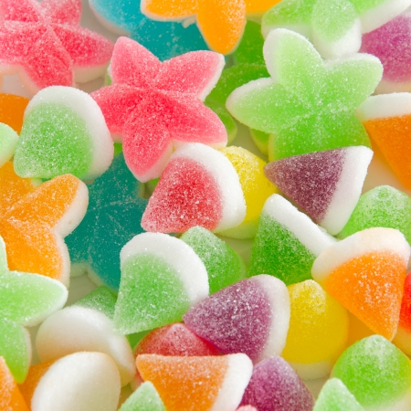 Many bright color jelly candies, sweets with sugar tasty as jujube and lollipops の写真素材