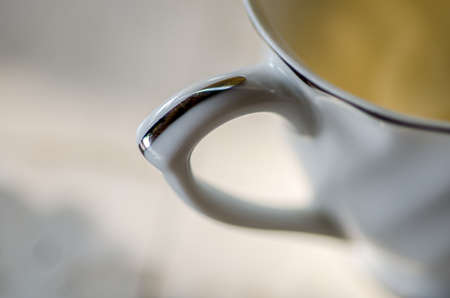 Close up half of coffee cup の写真素材