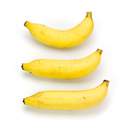 Three of bananas isolated on white backgroundの写真素材
