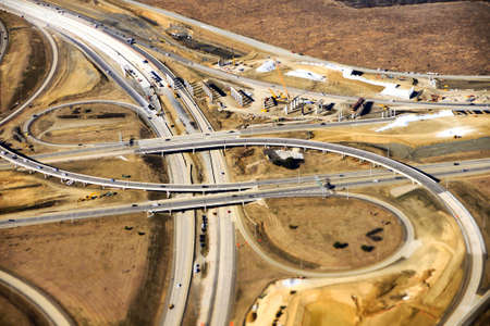 Aerial view of construction of new freeway ramp in the American Southwest