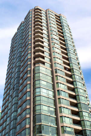 Modern Single Tower condominium building glass and concrete construction