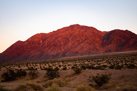 Reddened hills at sunset in Californiaの写真素材