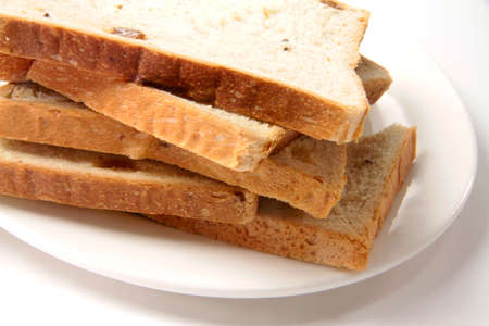 delicious bread in pieces on white background