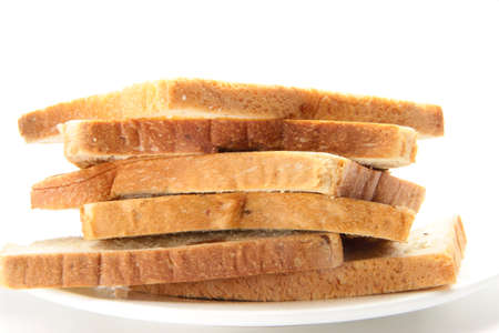 delicious bread in pieces on white background