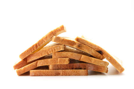 delicious bread in pieces on white backgroundの写真素材