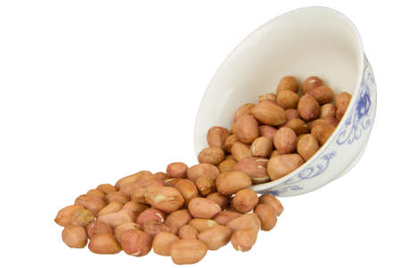 close up of peanut with china bowl isolated on white background