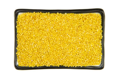close up of millet with china bowl isolated on white background