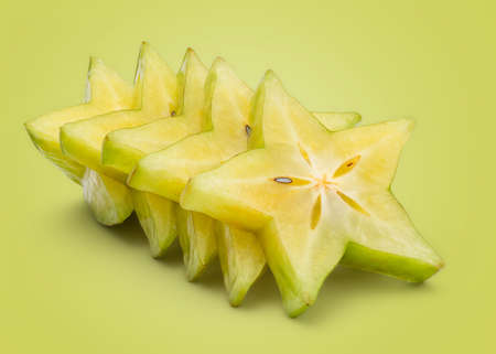 Fresh Carambola Isolated on Green Background