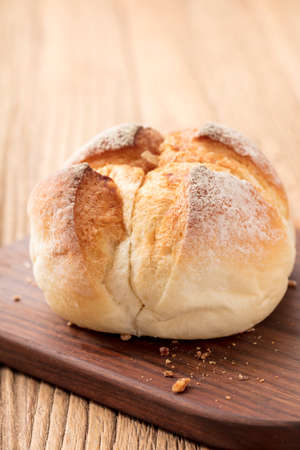 Close up view of a delicious bread on the wood table.の写真素材