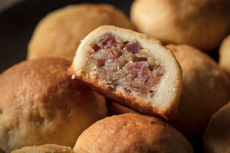 Cut mooncake close up view. Mooncake is a kind of traditional Chinese food for Mid-autumn festivalの写真素材