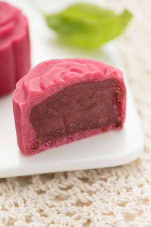 Delicious Mooncake, a kind of traditional Chinese Snack for Mid-Autumn Festival on the Table.