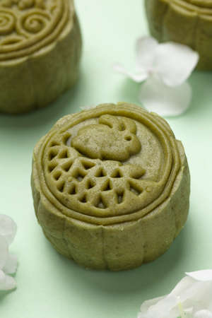 Beautiful Mooncake on Colorful Background with some Hydrangea.