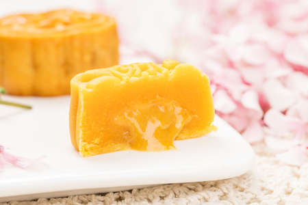 Delicious Mooncake, a kind of traditional Chinese Snack for Mid-Autumn Festival on the Table.