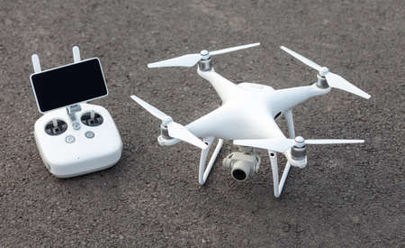 The View of a White Aerial Photographic UAV In the Air.