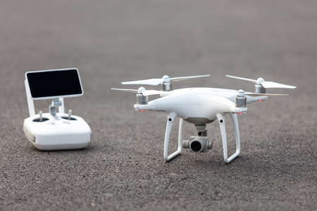 The View of a White Aerial Photographic UAV In the Air.