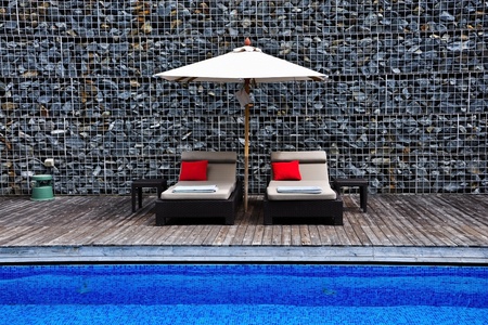 Sunbeds beside the pool, Hua Hin, Thailandの写真素材