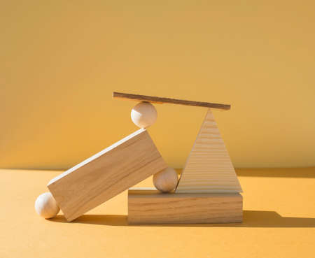 Geometric composition of several wooden figures. Balance and education concept.の写真素材