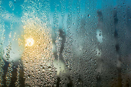 Colorful window mist on a clear winter morning created by winter, the artist.