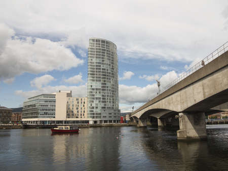 The river lagan in belfast with office blocks in background