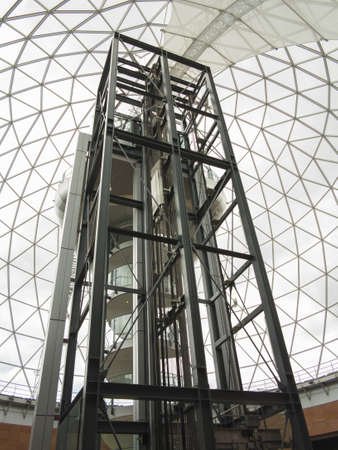 BELFAST, NORTHERN IRELAND - AUG 05 2013   The lift, stairs and glass dome of Victoria Square shopping centre in Belfast, Northern Ireland  The largest shopping mall in Northern Ireland  のeditorial素材