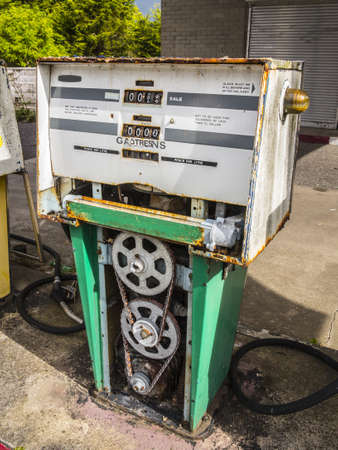 an old rusted petrol pump in ireland