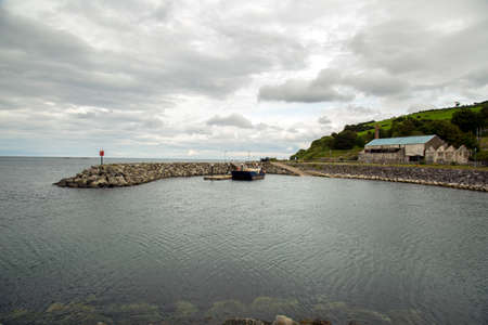 a harbour with barge dockedの写真素材
