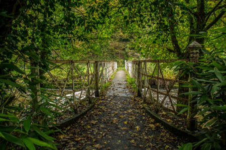 white metal bridge over the river blackwater north irelandの写真素材