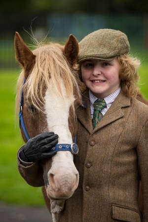 Portadown, Co.Armagh, North Ireland - 16th September 2017 -  A young horse show Competitor at Country comes to town a large country fair held yearly in Portadown North Irelandのeditorial素材