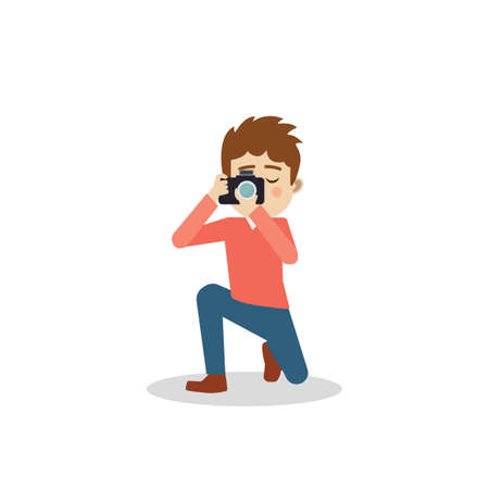 photographer kneeling down while taking a picture