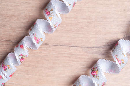 ribbon for hand made on wooden backgroundの写真素材