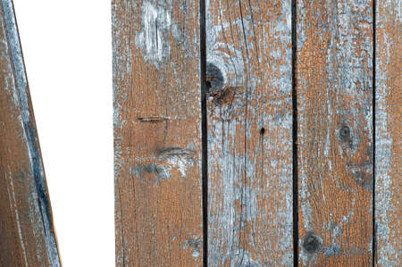 Old wooden fence with a hole. old wood background texture. Copy spaceの写真素材