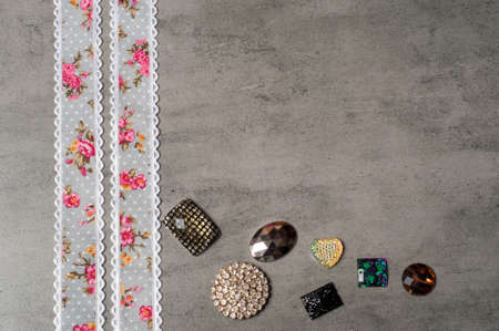 Ribbon on a grey background.Copy space.Flower ribbon.Handmadeの写真素材