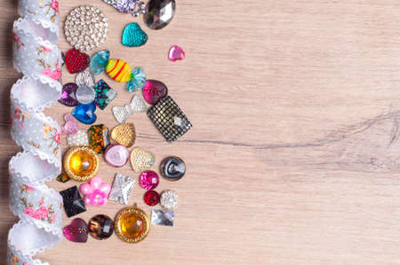 multi-colored decoration for sewing on wooden background .Copy Spaceの写真素材