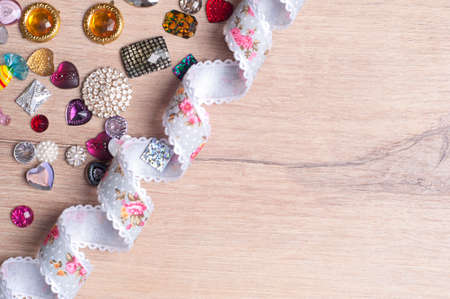 multi-colored sewn stones on a grey background.Copy Spaceの写真素材