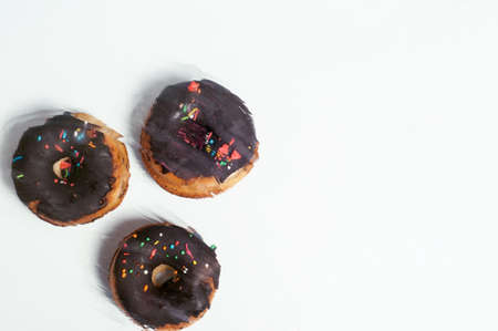 tasty donuts on a white background. Abstraction.Top viewの写真素材