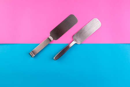 Pedicure tool on blue and pink backgroundの写真素材