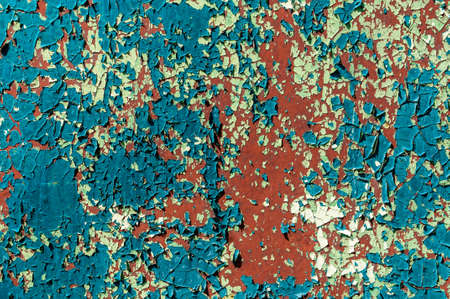 Cracked paint on a metal surface. backgroundの写真素材