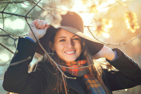 Autumn portrait of an happy girl with beautiful smile の写真素材