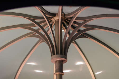 Under side of umbrella art showing arches.