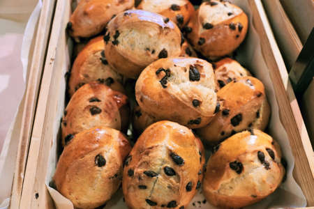 Fresh rolled breads are in the basket