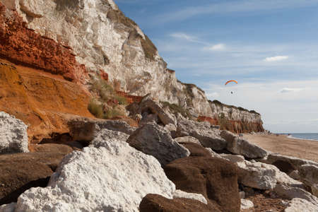 Para-glider and red and white limestone cliffs at the Hunstanton Beach, Norfolk, Englandの写真素材