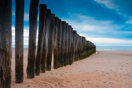 Breakwater on the beach in Calais in Franceの写真素材