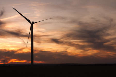 Windfarm and sky with volcanic dustの写真素材