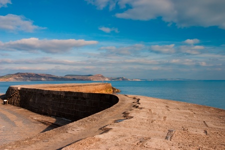 The famous pier at Lyme Regis in Great Britainの写真素材
