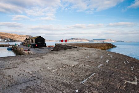 The famous pier at Lyme Regis in Great Britainの写真素材
