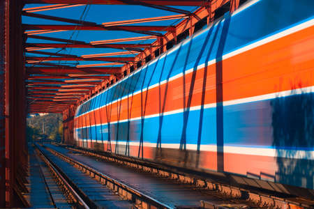 Abstract composition of moving train on the old railway bridge