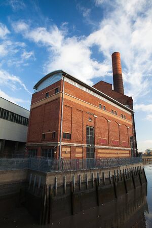 Old factory and slime filled canal West Londonのeditorial素材